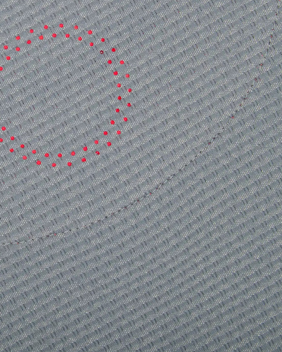Halo FS1 Midnight Sun fabric close-up, the coral Halo Circle Mark at the upper left